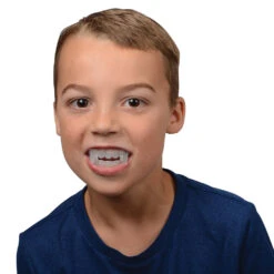 Halloween Glow Teeth Party Favor (144 Pieces) -Carnivals Source Toys 574 103